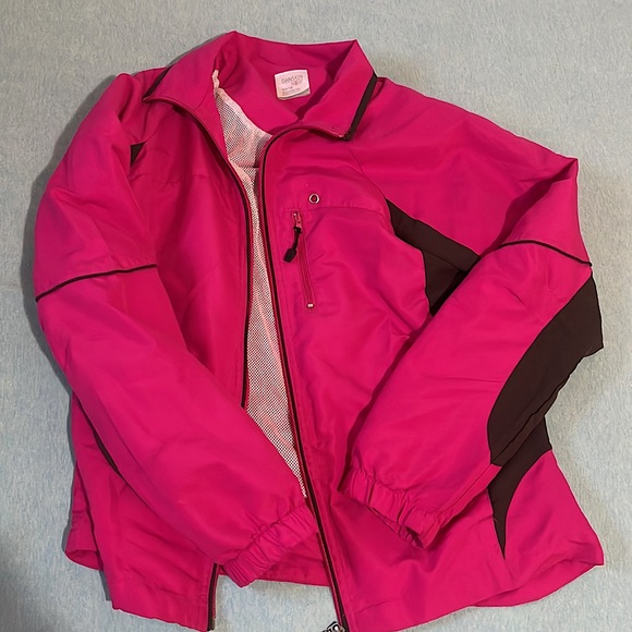 It’s pink and black jacket, it has 1 zip and 2 other pockets, white net inside. - Picture 2 of 3